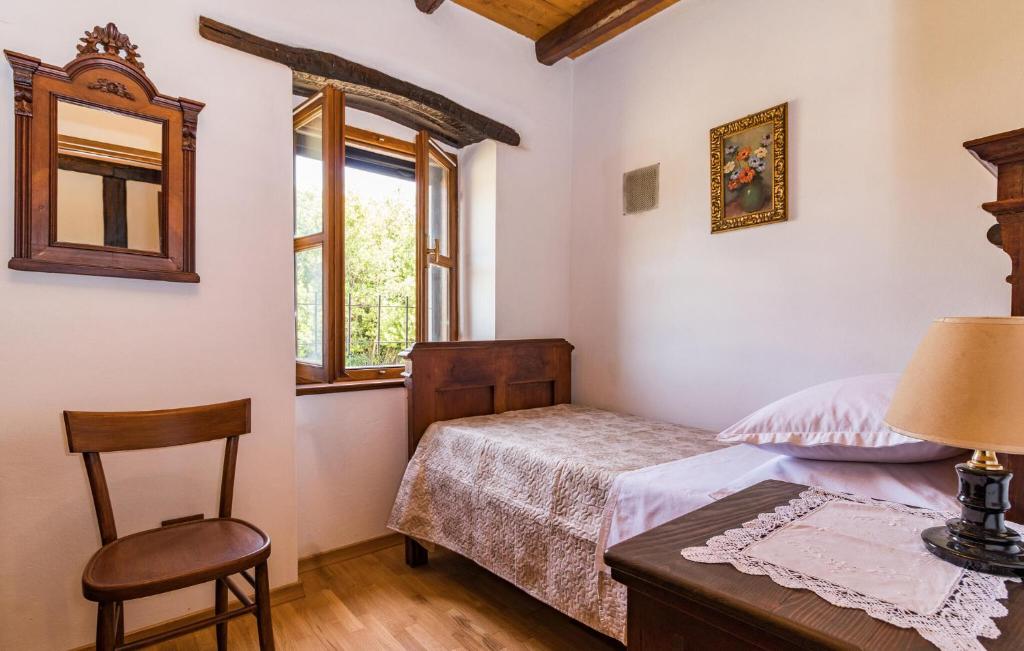 Awesome Home In Kosinozici With Kitchen photo 1