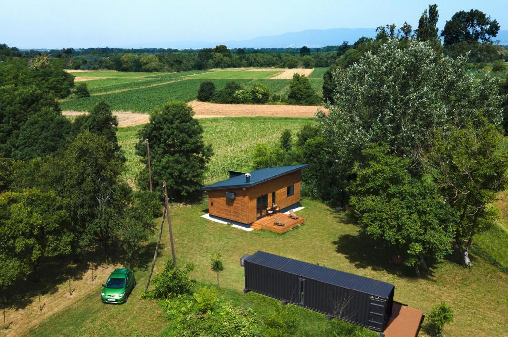 Wooden house and modern container in Lekneno, near Zagreb