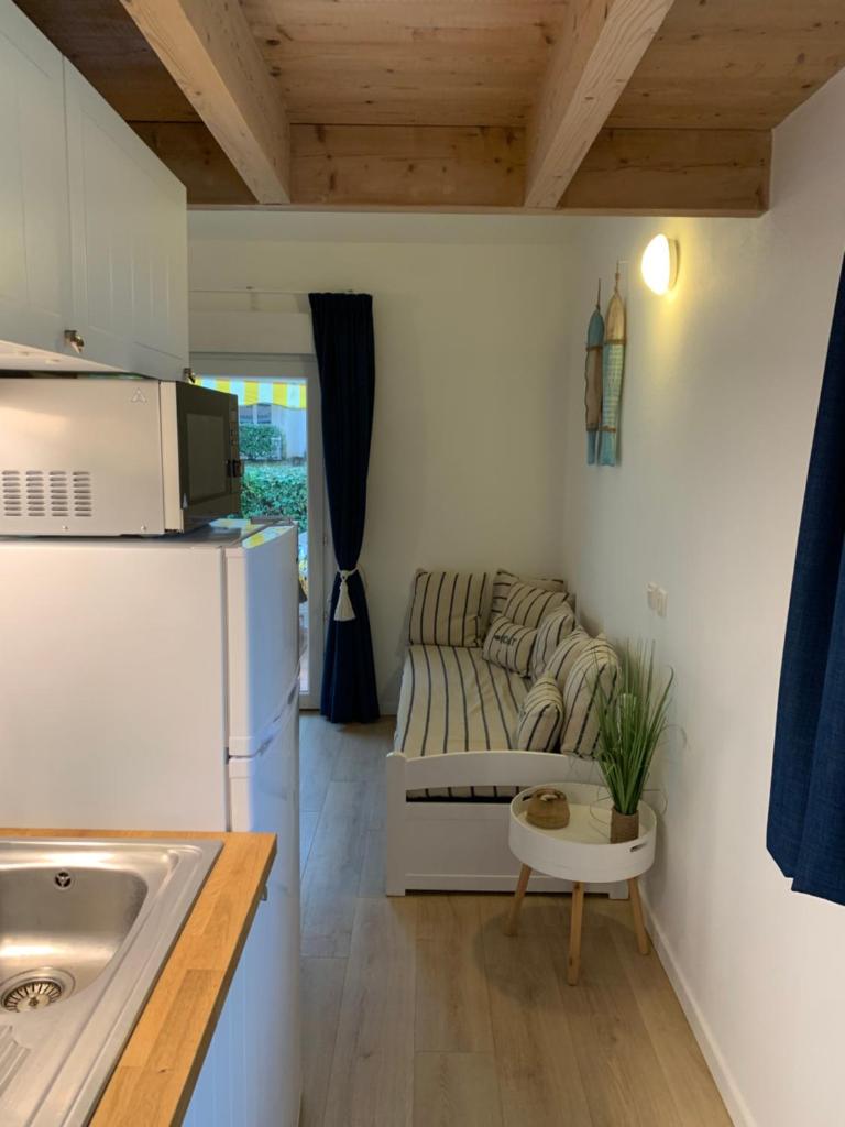 Maisonnette avec piscine intérieure chauffée, à 400 m de la plage et ménage de fin séjour compris H5 photo 3