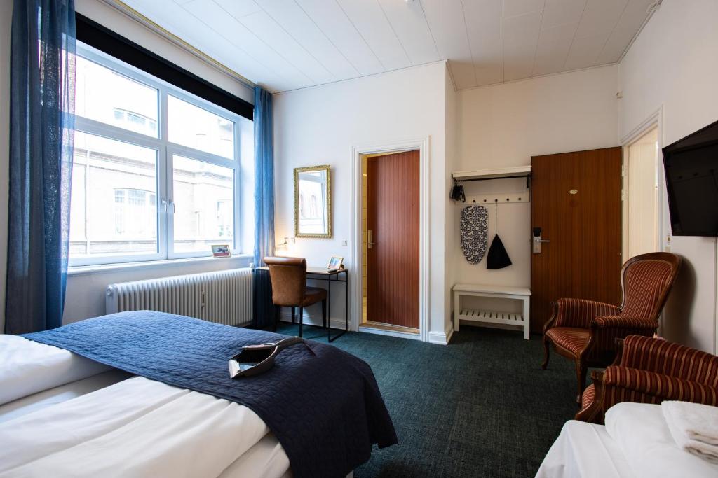 Milling Hotel Ansgar - Tap to explore photos