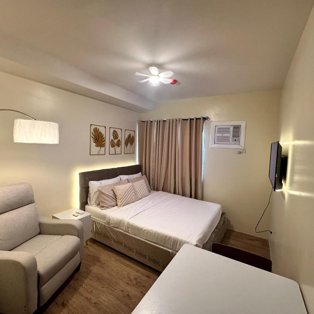 Condo near Nuvali Enchanted Kingdom & St. Benedict photo 1