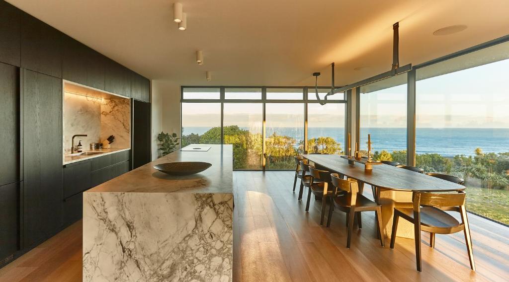 ONYX HOUSE - Wainui Beach photo 1