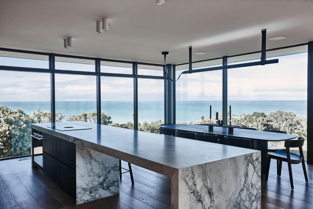 ONYX HOUSE - Wainui Beach photo 2