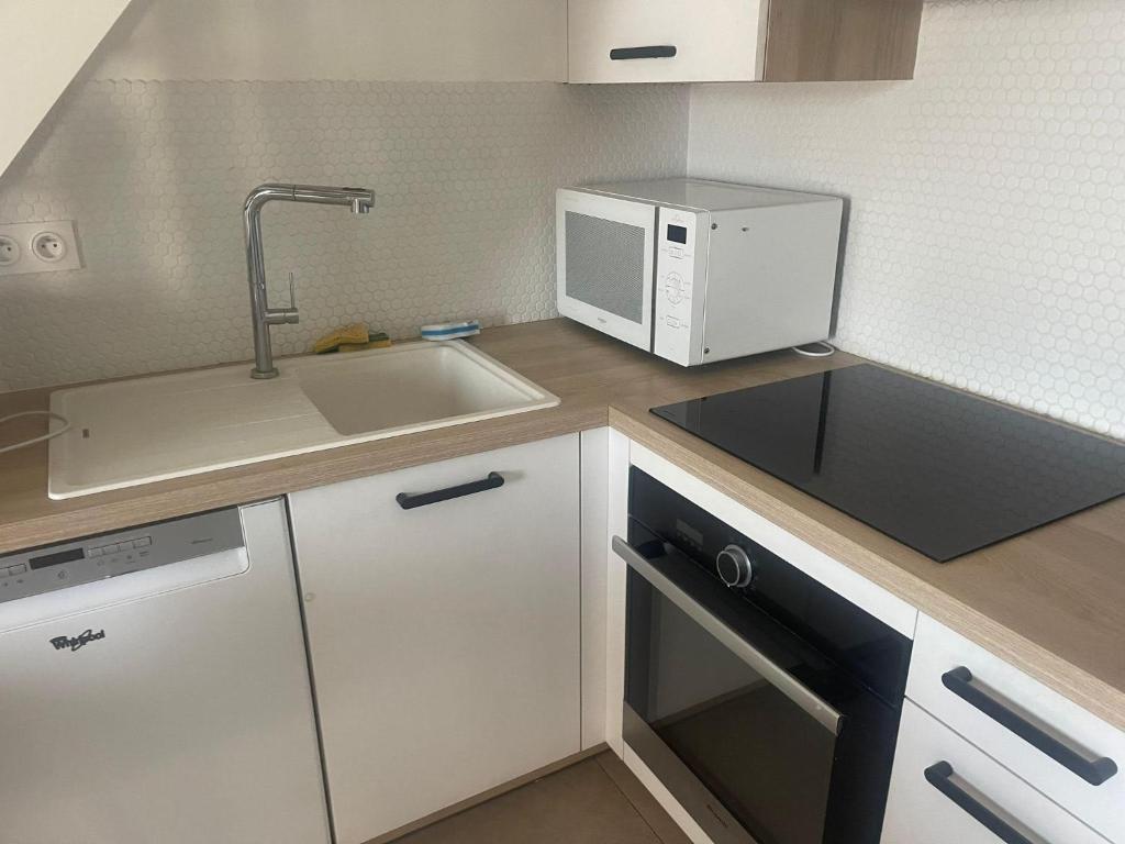 Très beau duplex avec climatisation et piscine photo 2