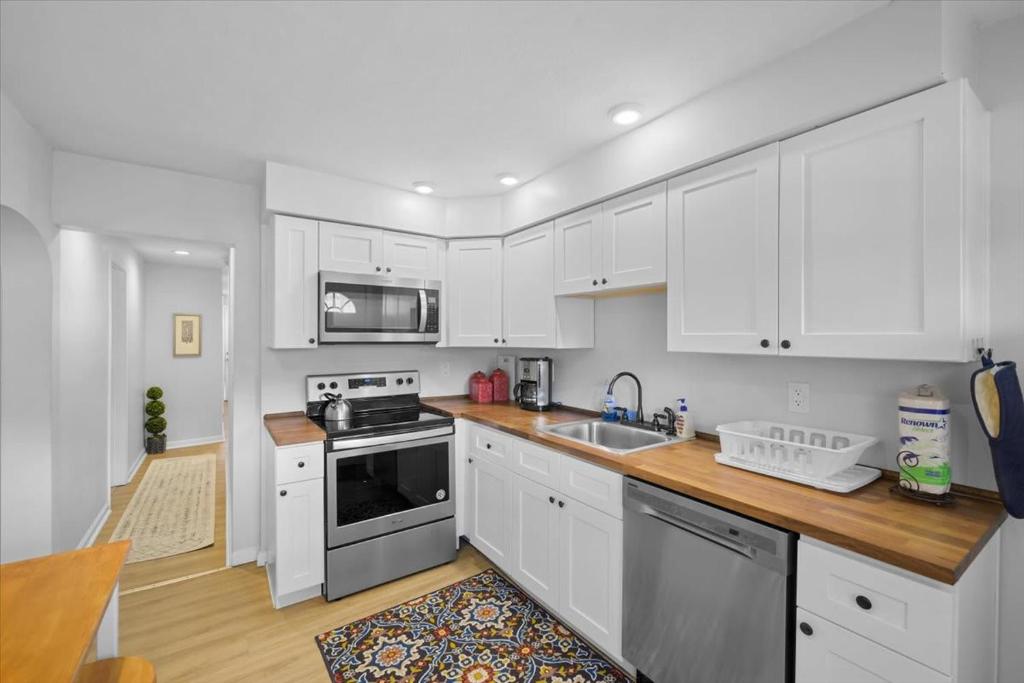 Great Two Bedroom w off Street Parking to Explore the City Close to Downtown Airport Ballparks image