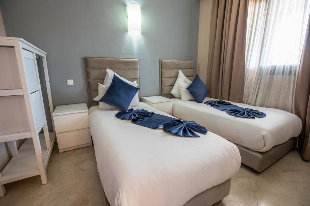 Oliva Hotel Condominium Marrakech - Tap to explore photos