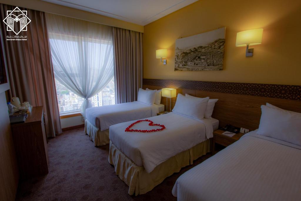 Manarat Gaza Hotel - Al Haram Tower - Tap to explore photos