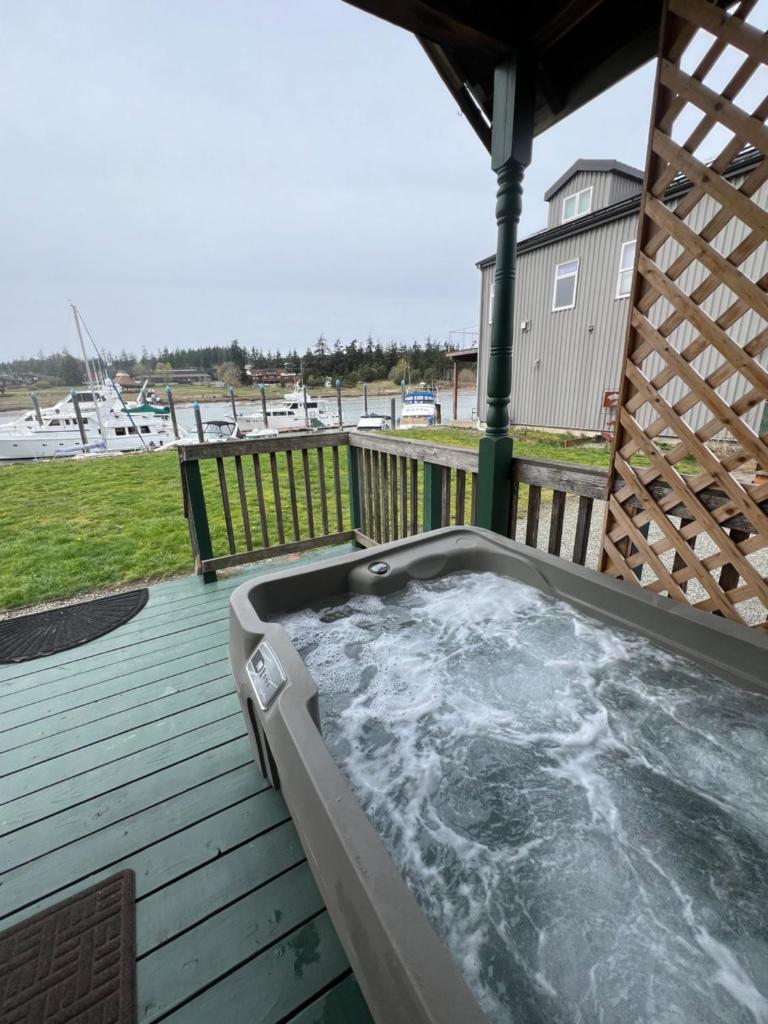 Bridge Tender Shack with hot tub on deck photo 1