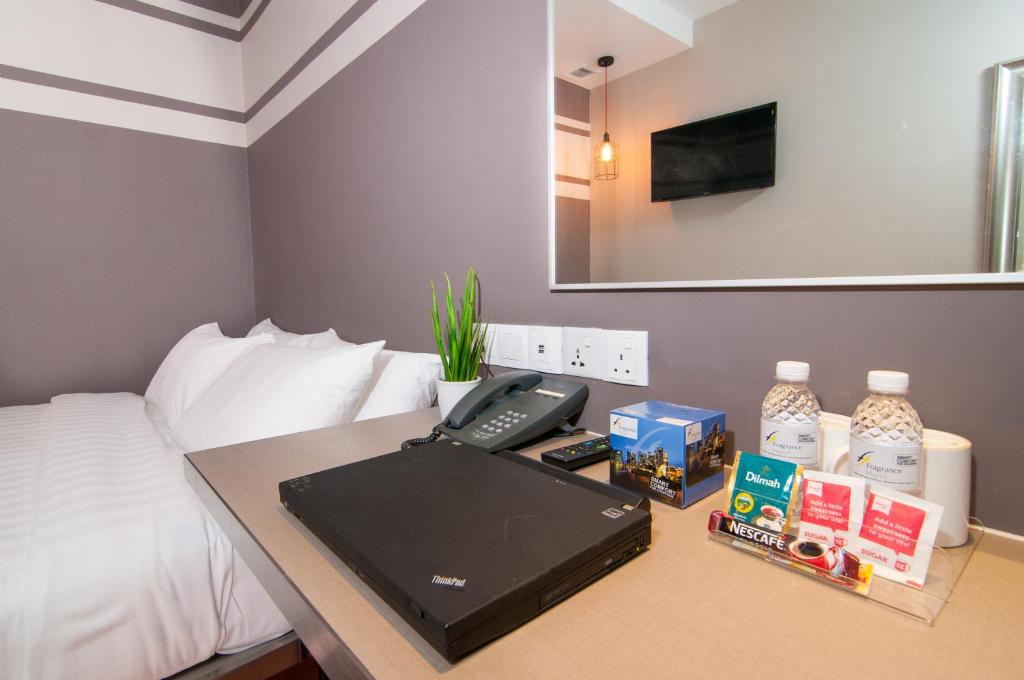 Двухместный (Standard Room with free WIFI (No Window)), Fragrance Hotel - Kovan