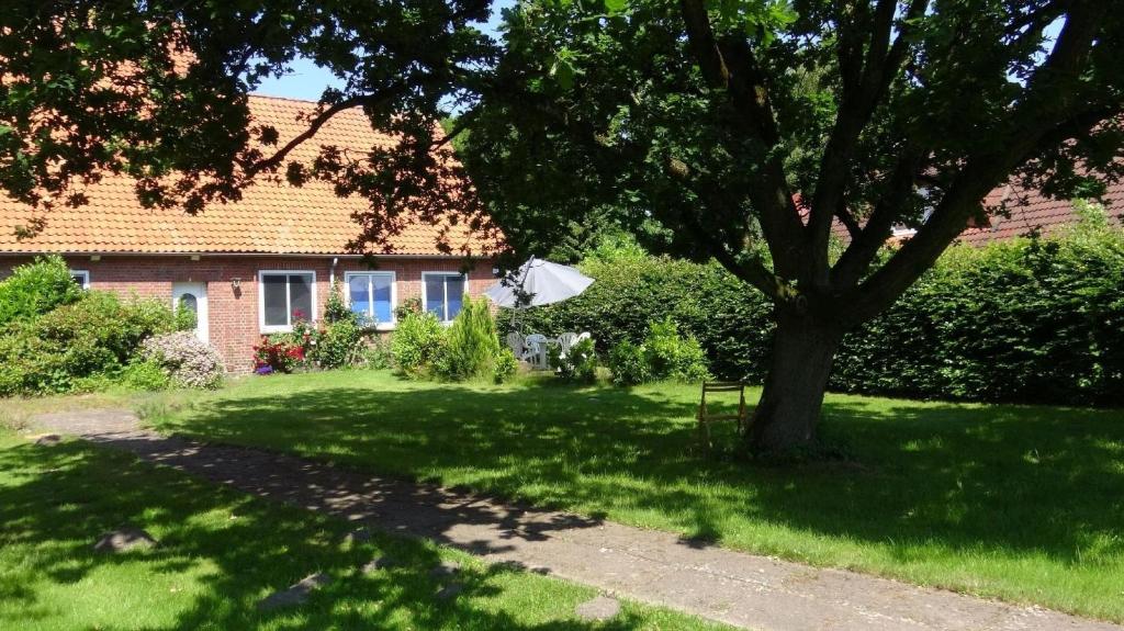 Appartement in Osterbruch mit Grill, Terrasse und Garten