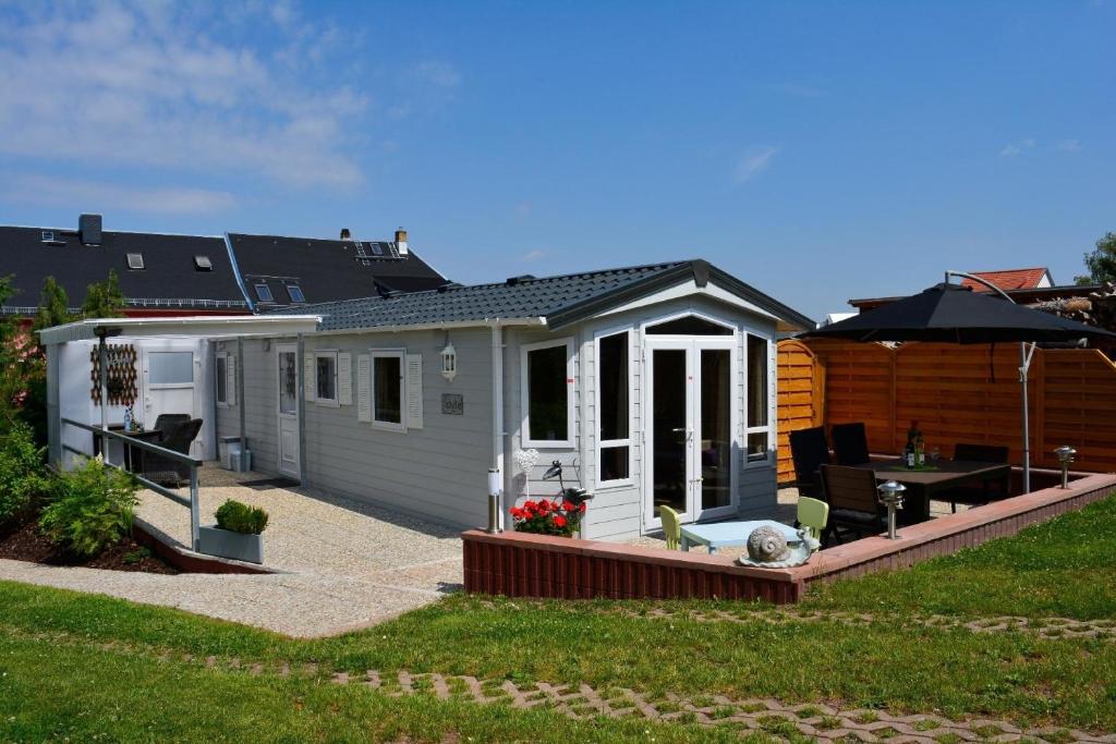 Ferienhaus für zwei Erwachsene und zwei Kinder mit Terrasse - b56212