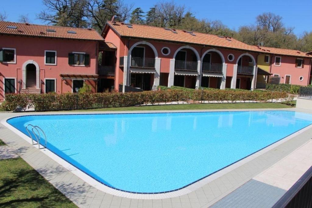 Helle Ferienwohnung in Santo mit Garten, gemeinsamem Pool und Terrasse photo 3