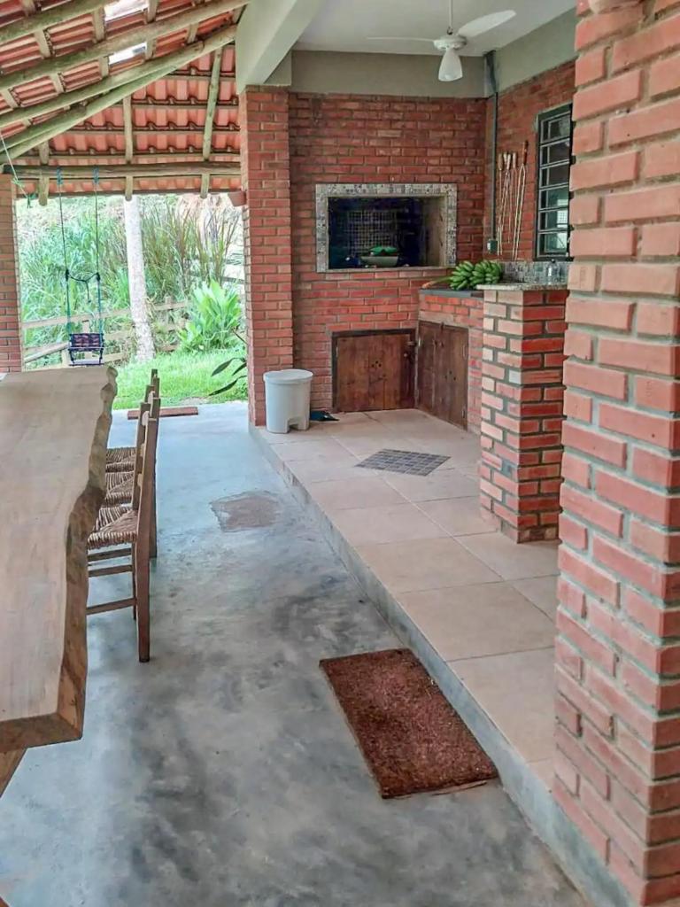 Cabana com cachoeira no quintal photo 1
