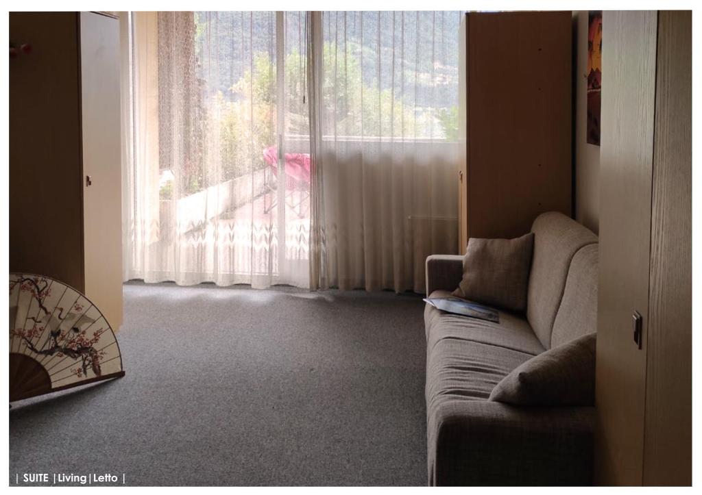 LF_SUITE_ Lugano Lake_ Ampia Terrazza ; Spiaggia privata_ WI-FI_ Netflix_ photo 3
