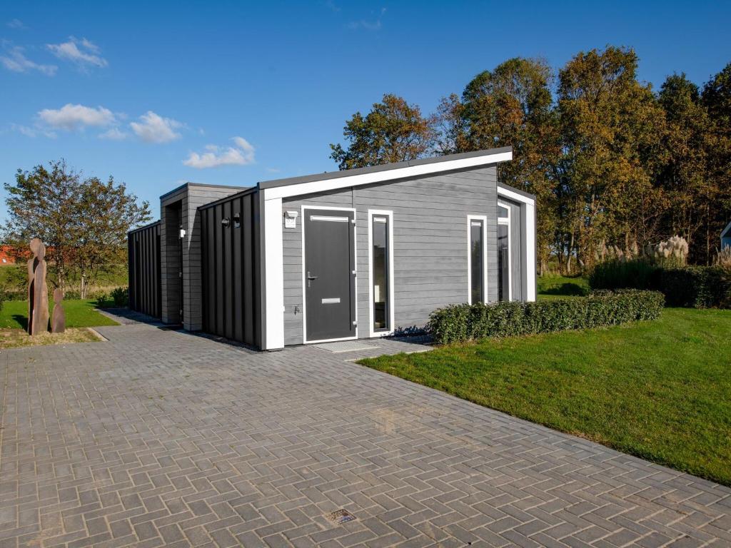 Modern chalet with a fireplace near the Oosterschelde photo 1