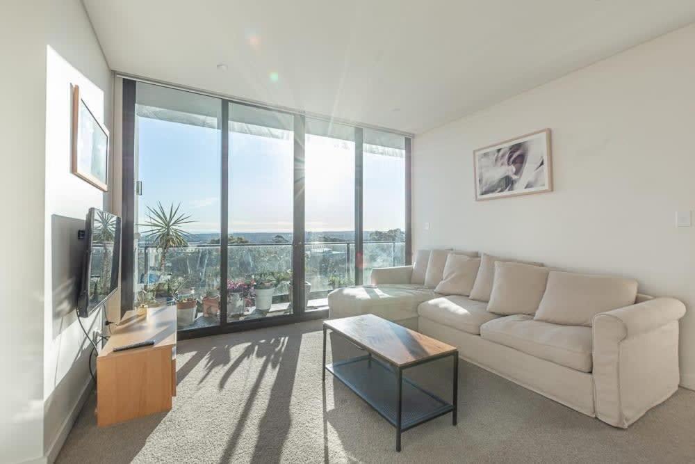 Sun-Splashed 2BD Apt near CBD photo 1
