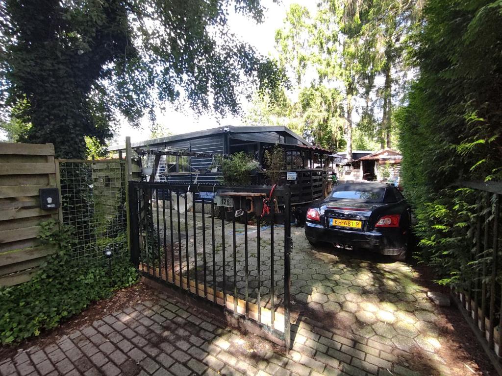 "Tempat Senang" chalet on the beautiful Veluwe with airco sauna bbq jacuzzi beamer and dog photo 1