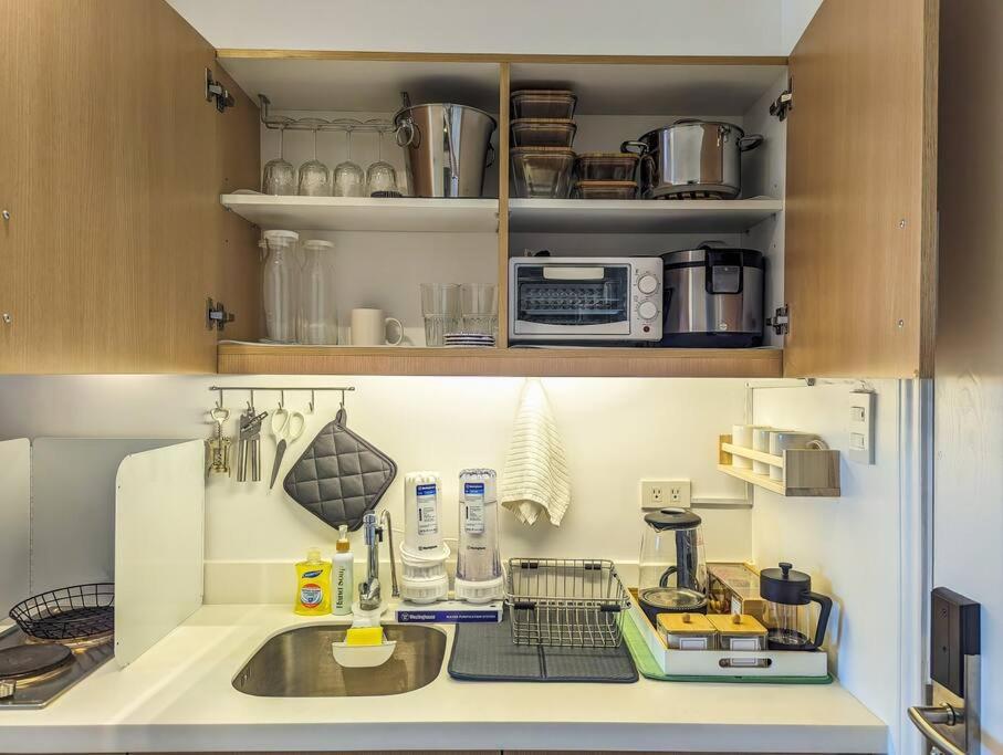 Bright & Stylish Studio Condo in Commonwealth, UP Diliman - Tap to explore photos