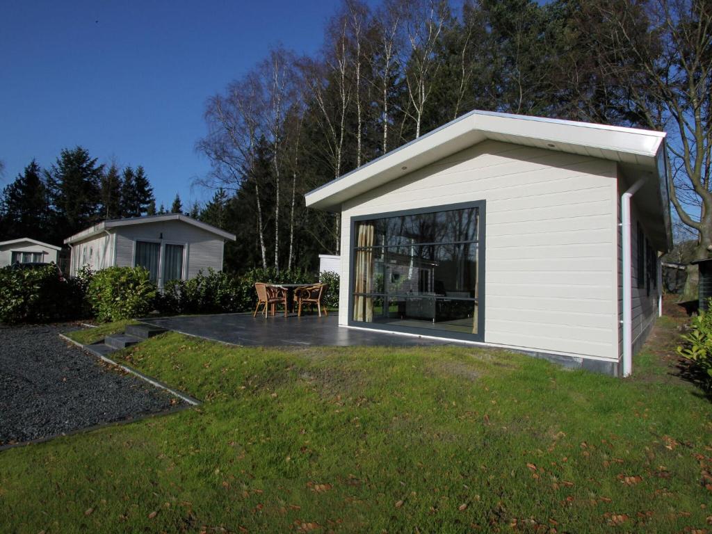 Nice chalet with dishwasher surrounded by forest photo 1