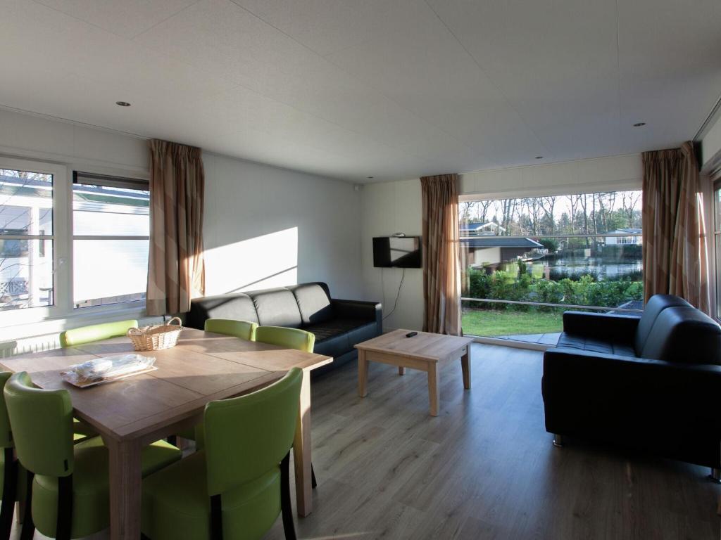 Nice chalet with dishwasher surrounded by forest photo 2