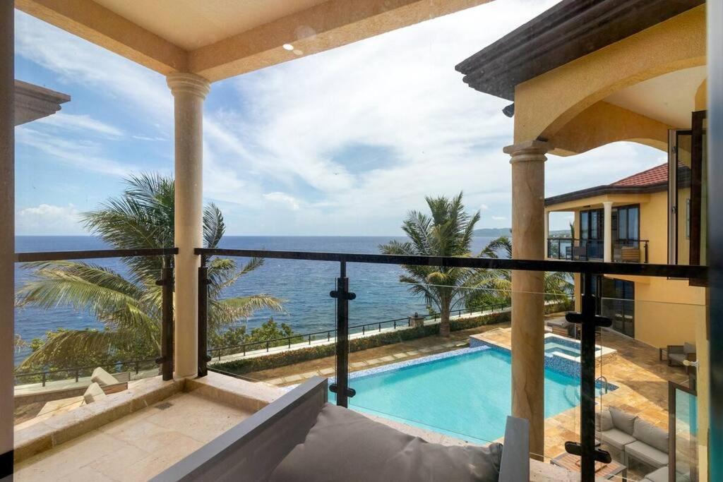 Fully Staffed Oceanfront Luxe Villa Near Ocho Rios photo 4