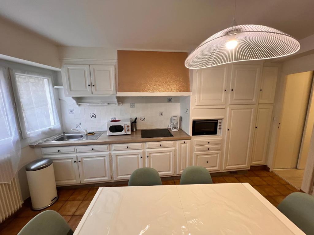 Appartement RDC 9 personnes, 2 chambres, wifi, proche du centre photo 4