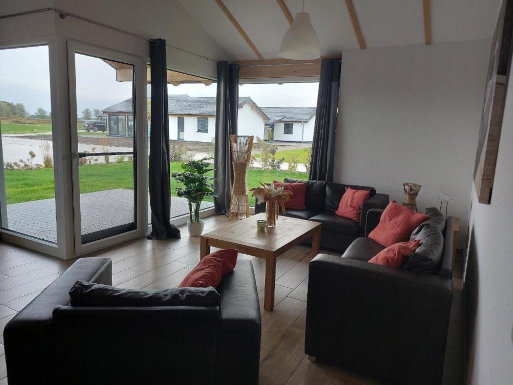 G13 Nordsee freihstehendes Ferienhaus in Eckwarderhörne mit Garten, Waschtrockner, Fahrradschuppen photo 2
