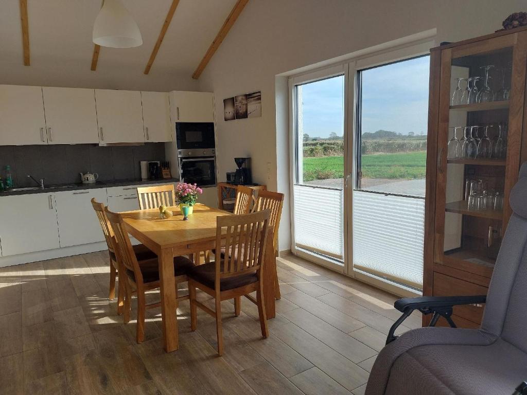 G13 Nordsee freihstehendes Ferienhaus in Eckwarderhörne mit Garten, Waschtrockner, Fahrradschuppen photo 3