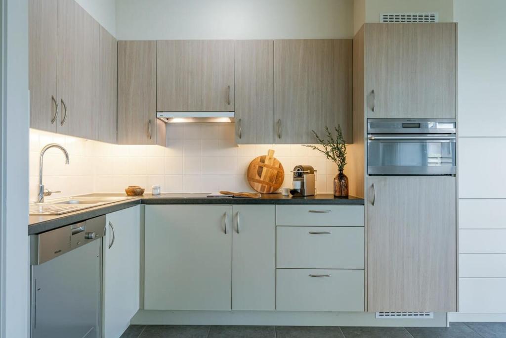 Huswell - Bright apartment with large and sunny garden photo 3