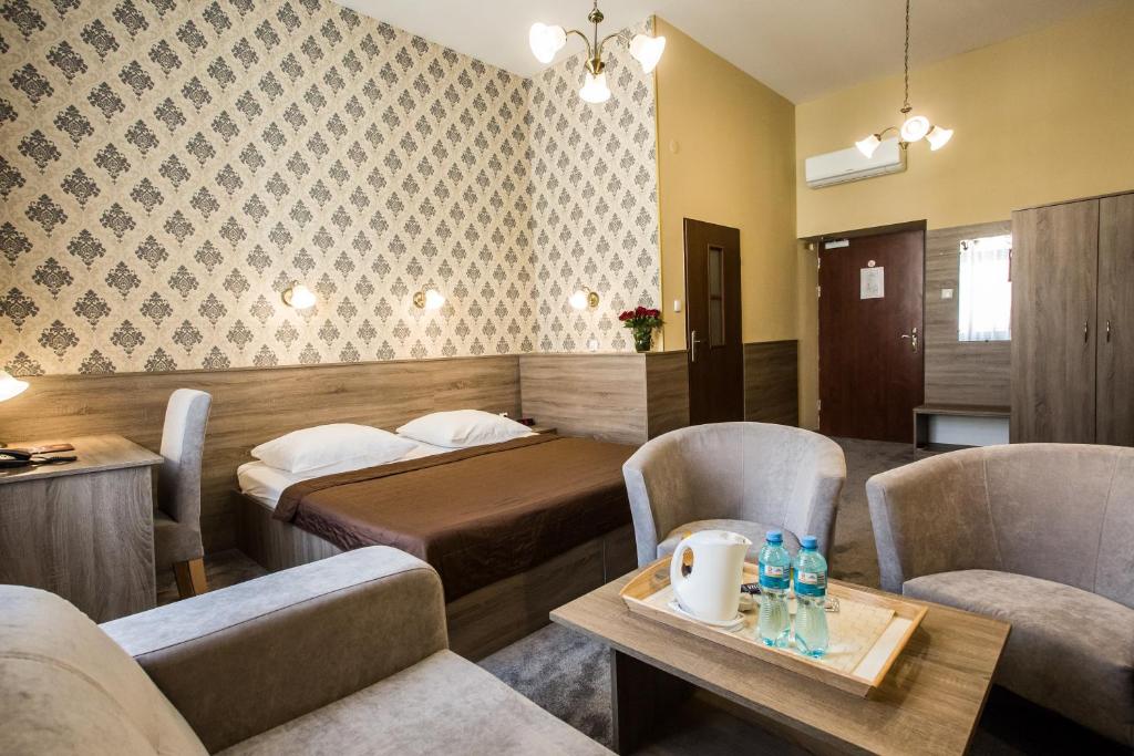 Hotel Maksymilian - Tap to explore photos