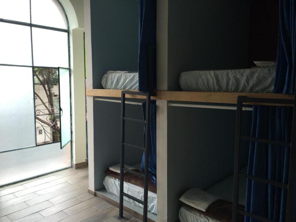 Номер (Кровать в общем 8-местном номере для мужчин), Capsule Hostel