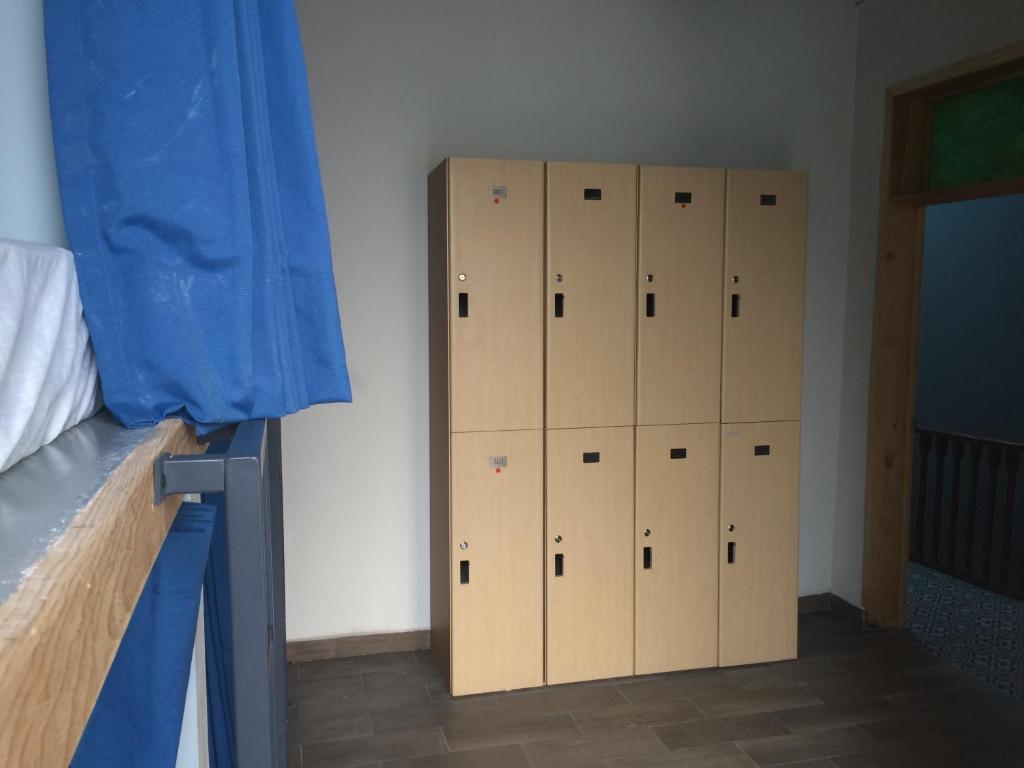 Номер (Кровать в общем 8-местном номере для мужчин), Capsule Hostel