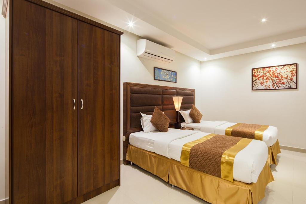 Burj Al Hayah Hotel Suites Al Falah - Tap to explore photos