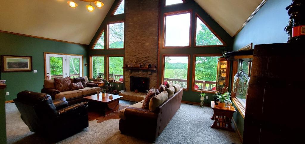 A-Frame Getaway with Hot tub, Sauna, Fire Pit & Pond - Station Camp Getaway - Tap to explore photos