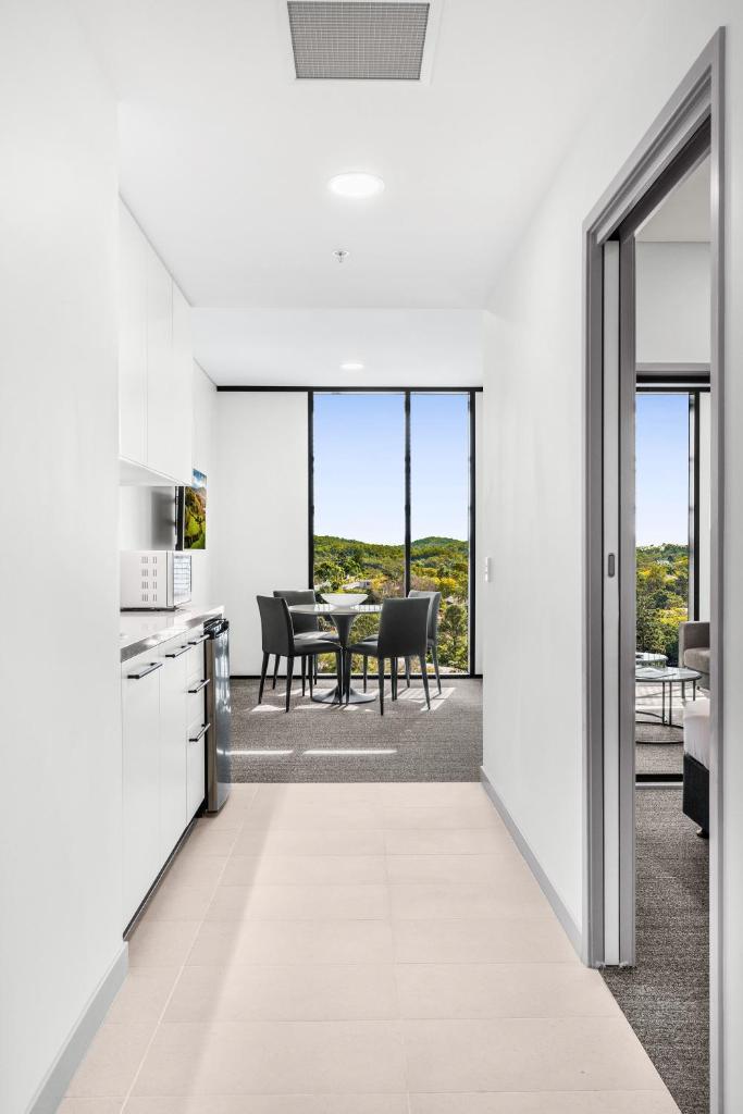 Essence Suites Taringa - Tap to explore photos