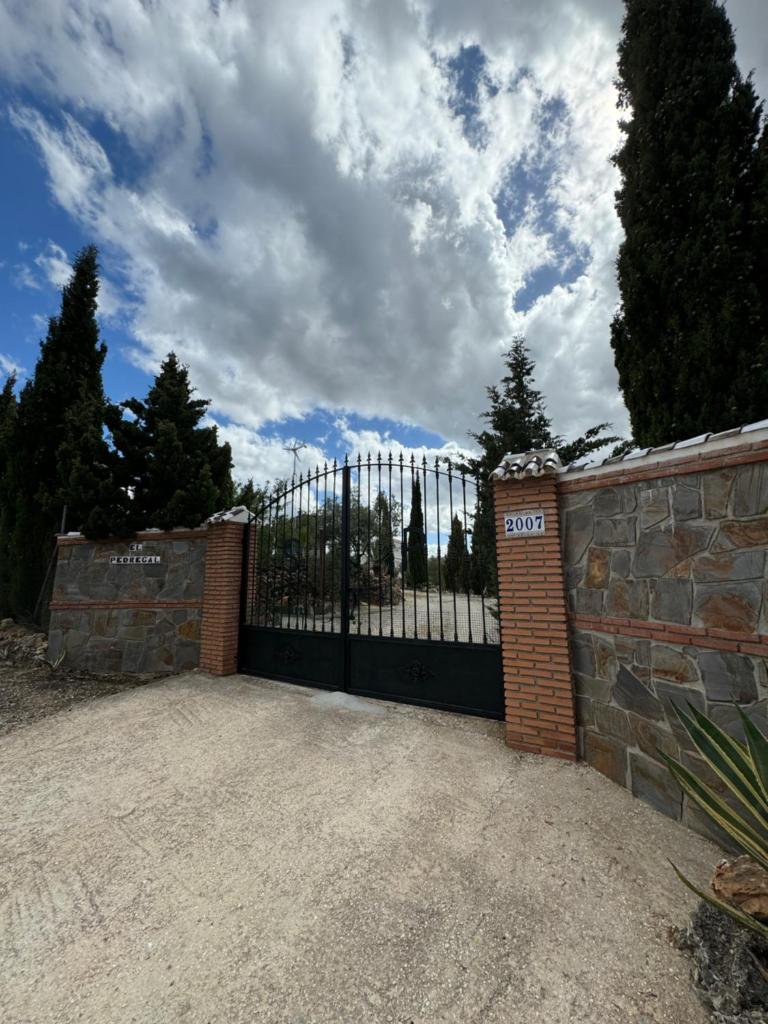 Villa El Pedregal - Parque Sierra de las Nieves - Tap to explore photos