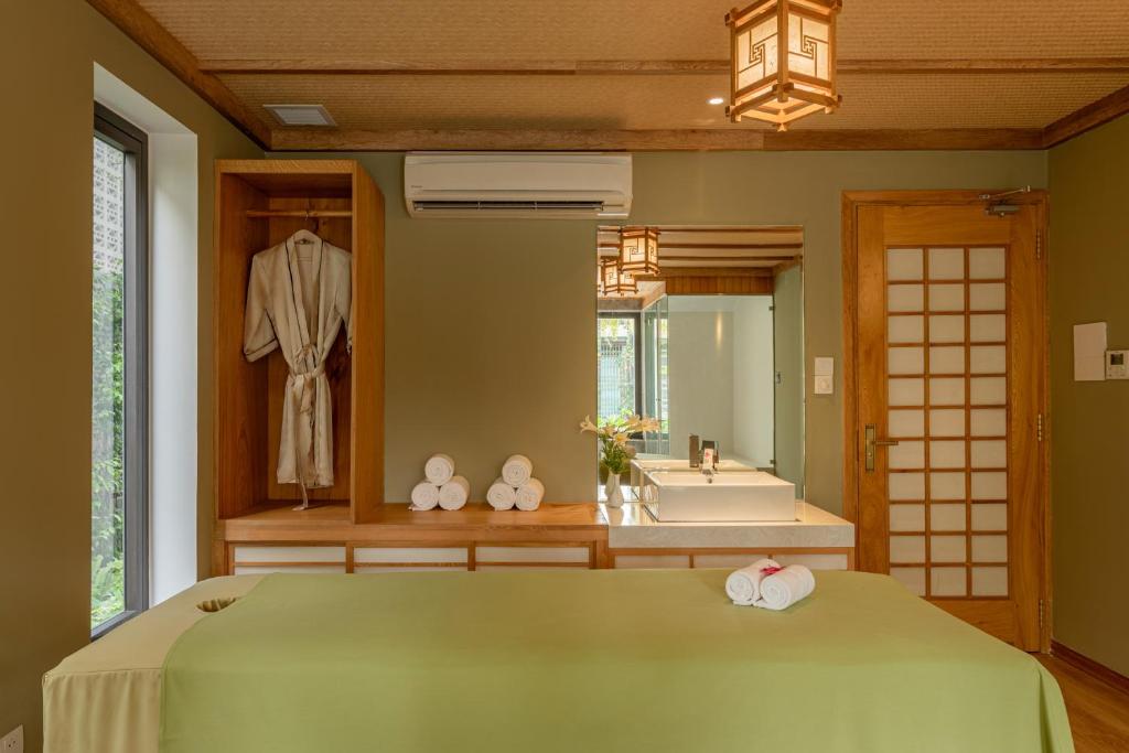The Saga Hotel Hoi An - Tap to explore photos