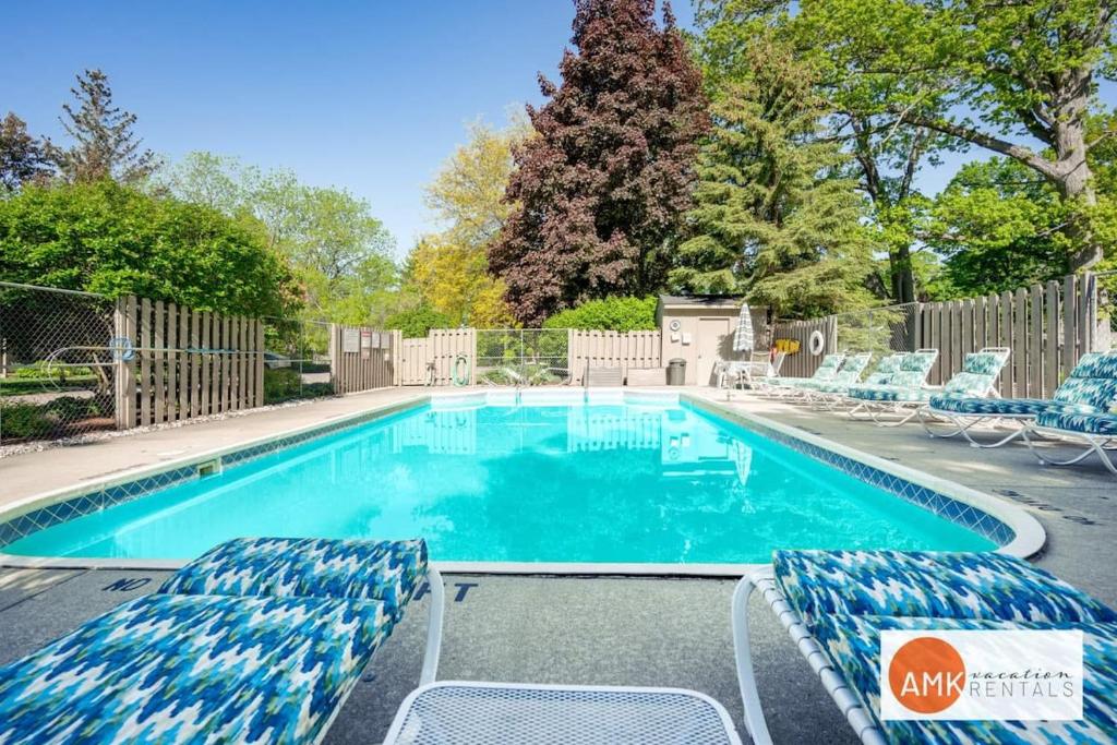 This Charming 2 bed condo is next to downtown Saugatuck and includes a pool! image