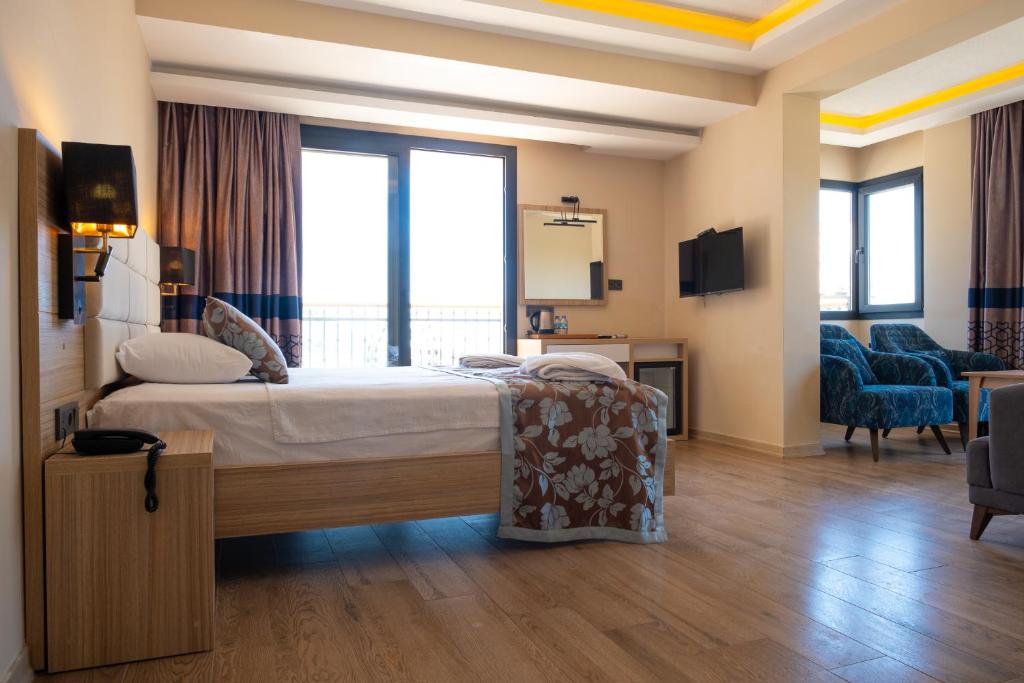Perdikia Hill Hotel And Villas - Tap to explore photos