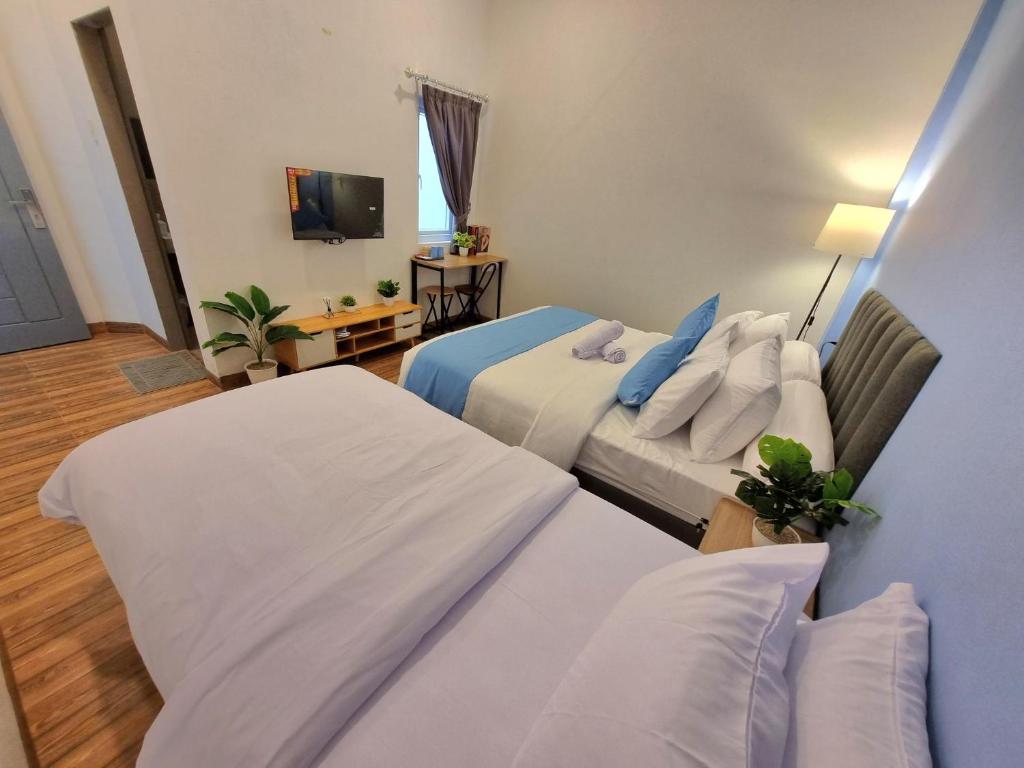 Zizi Homey 302 Cemara Asri