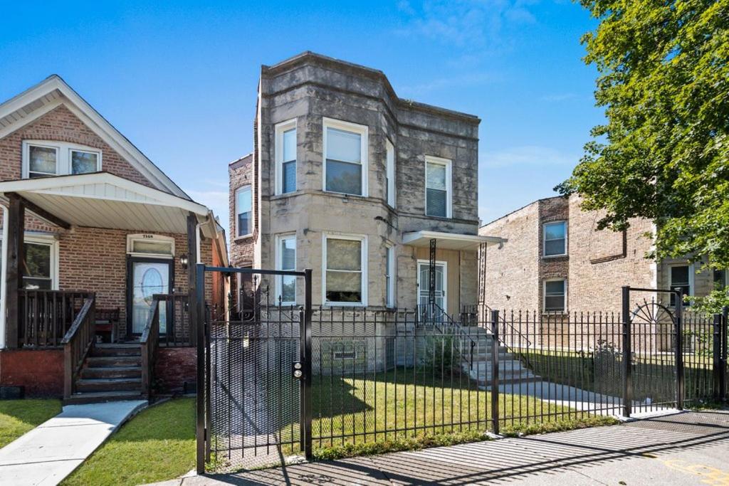 Newly rehabbed Greystone with 2 private apartments, backyard, garage, laundry, close to expressway image