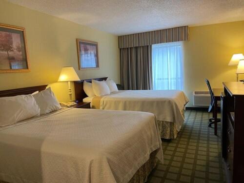 Days Inn & Suites by Wyndham Sutton Flatwoods - Tap to explore photos