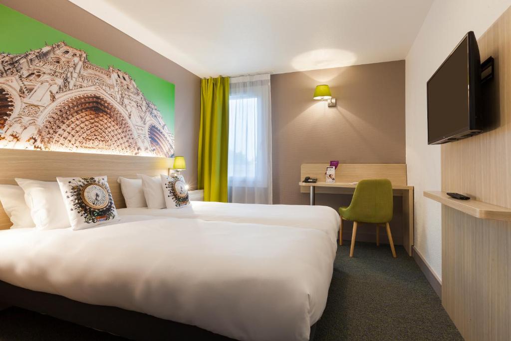 Brit Hotel Confort Amiens - Tap to explore photos
