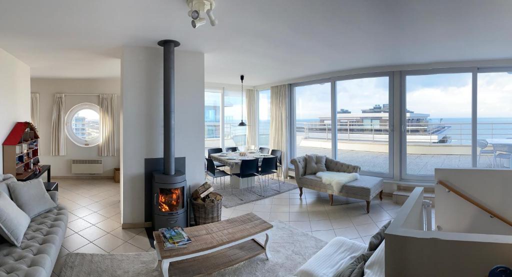 Duplex penthouse super zeezicht photo 2