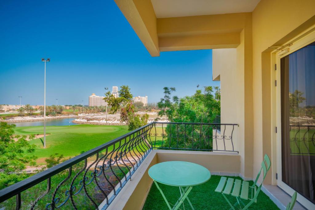 Live surrounded by gorgeous Green Golf fields photo 2