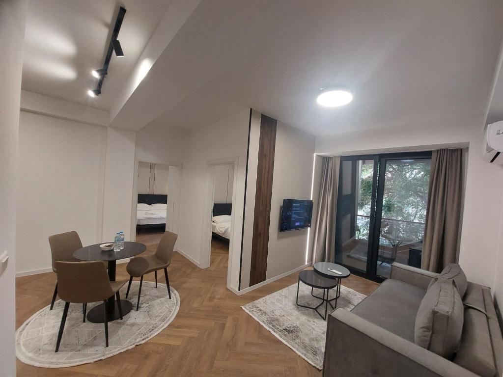 Executive Suites by Modern Living Room Type - Two-Bedroom Apartment with Balcony