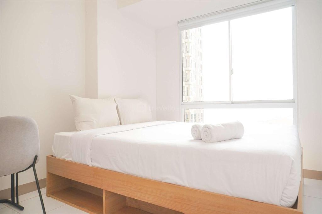 Well Furnished and Restful 2BR Tokyo Riverside PIK 2 Apartment By Travelio, Tangerang