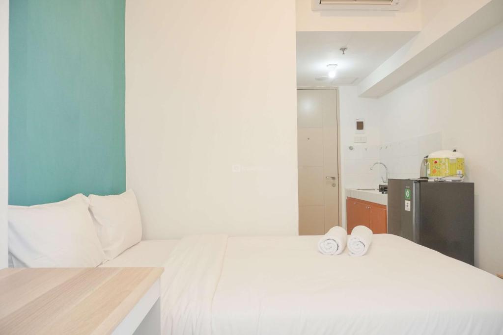Fully Furnished Studio at 11th Floor Tokyo Riverside PIK 2 Apartment By Travelio