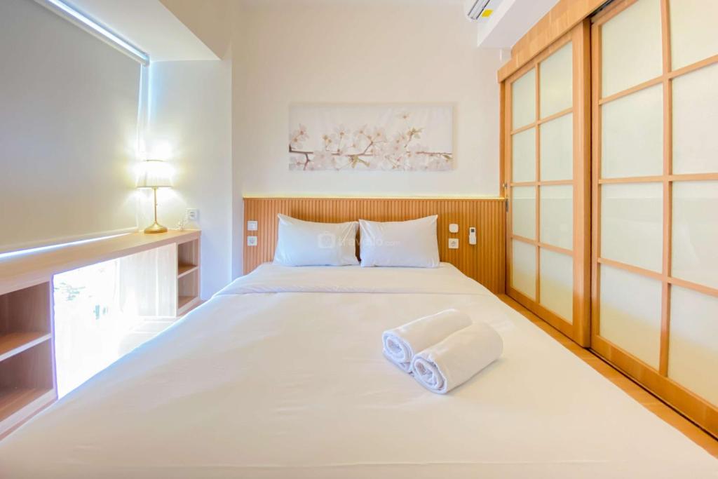 Spacious and Homey 1BR Tokyo Riverside PIK 2 Apartment By Travelio