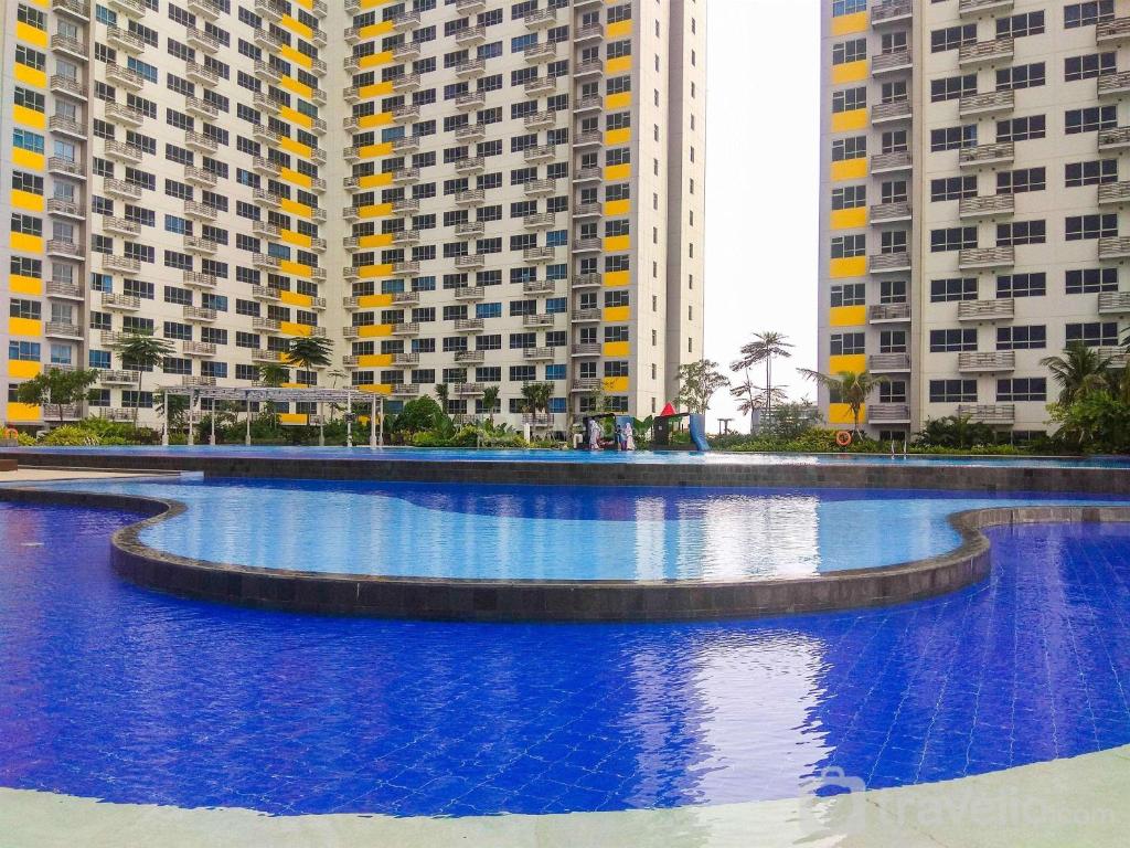 Gorgeous 2BR Springlake Summarecon Apartment By Travelio photo 3
